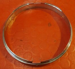 553267 Tussen rand koplamp chroom LUCAS