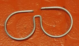 509191 Veer "bril" voor haak koplamprand